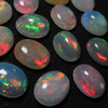 8x10 mm oval - Ethiopian Opal - really high quality CABOCHON have amazing beautifull flashy fire all around in the stone - 14 pcs